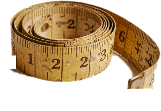 A coiled yellow sewing tape measure with its tail trailing off, cut out on a transparent background